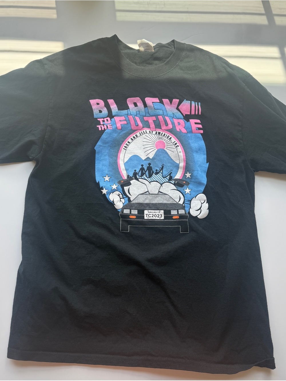Port and Company Black Graphic Long Sleeve Tee with Pink and Blue Print